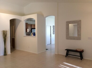 Great room w/arched entryways