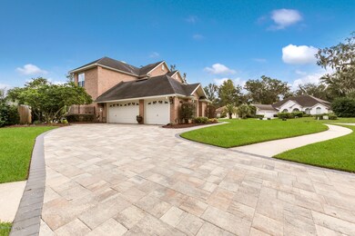 3 CAR SIDE ENTRY GARAGE PAVER DRIVEWAY