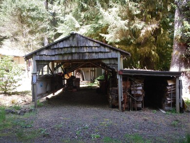 Carport and wood storage