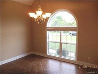 Dining area from kitchen. Large window allows plen