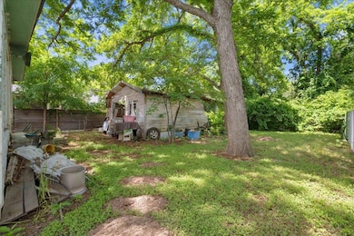 View of fenced backyard