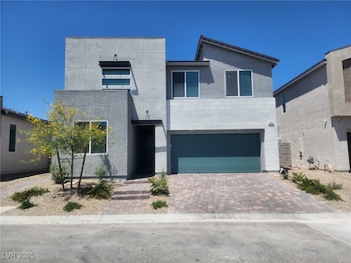 Contemporary house featuring a garage, driveway, a