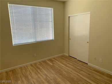Unfurnished room featuring wood finished floors an
