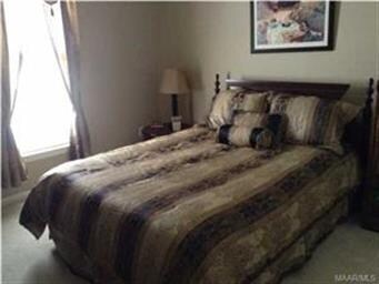 A spacious guest bedroom.