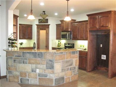 Kitchen. Granite counters, pantry, custom cabinets