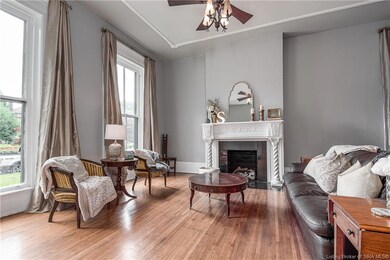 Front parlor boasts original wood flooring, floor 