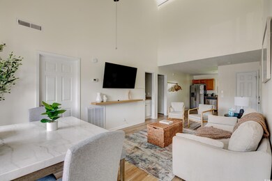 Living area featuring light wood-style flooring, a