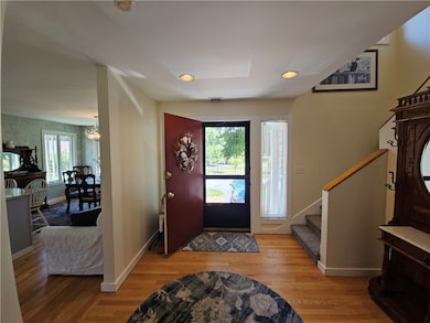 Front Door/Foyer/ view stair to 2nd floor and kitchen/dining