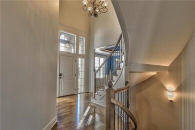 Dramatic curved stairway to impress your guests.