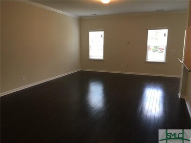 Large family room with beautiful hardwood floors!