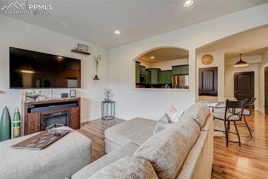 Living room with light wood-type flooring
