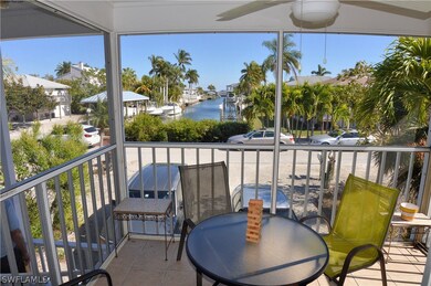 UPPER LEFT UNIT:  TILED, SCREENED LANAI WITH CANAL