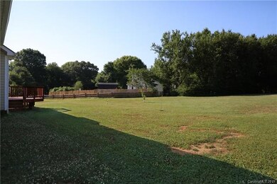 Archadeck overlooking beautiful rear yard.
