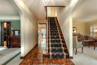 Be invited into the foyer with ornamental crown mo