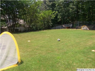 Behind the house is this super, irrigated lawn spa