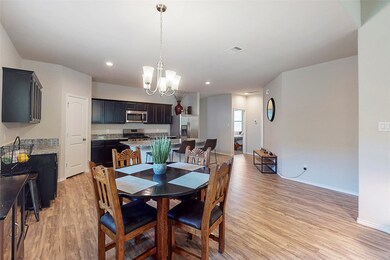 Dining area is nice sized and open to the kitchen and family room