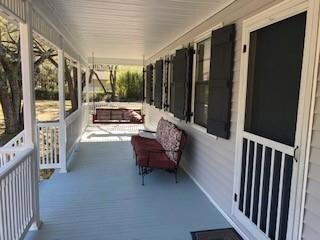 Front Porch With 2 Swings