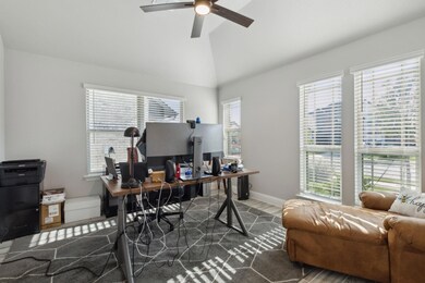 Secluded office with views of the front yard has F