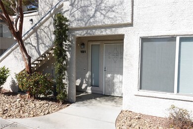 Property entrance with stucco siding