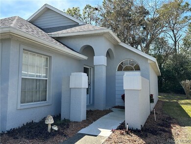 ANOTHER VIEW OF THE COVERED FRONT ENTRANCE
