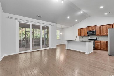 Kitchen with appliances with stainless steel finis