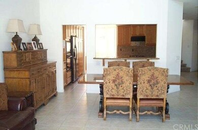 DINING AREA IN GREAT ROOM OVERLOOKING THE BREAKFAS