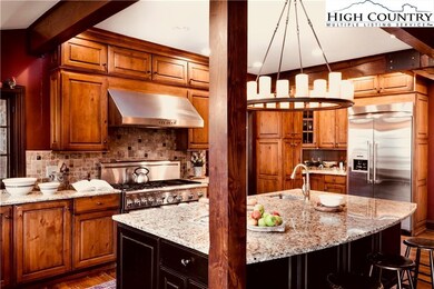 Gas range, granite countertops, beautiful craftsma