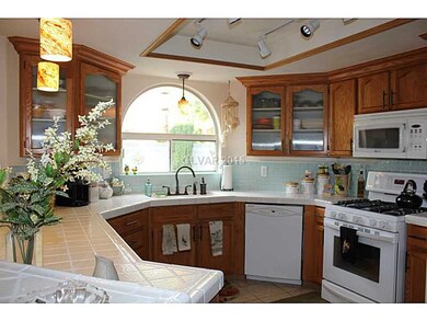 Kitchen. Notice the track lighting in this attract