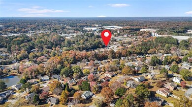 View of property location featuring nearby suburban area