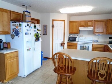 This view shows the corner pantry and doorway to t