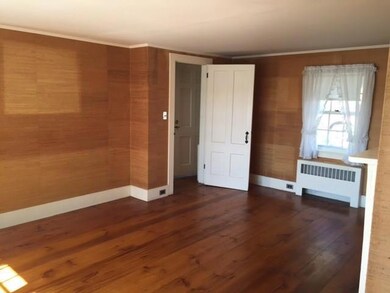Looking from living room to front door