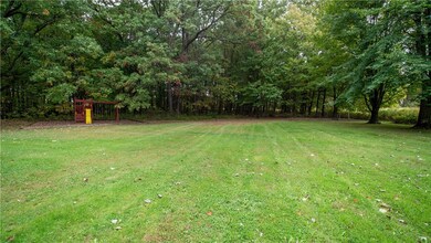 Level yard on 1.55 acres.