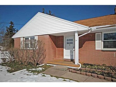 Exterior Front. Maintenance free brick and vinyl t
