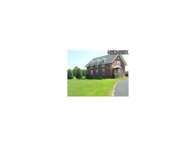 The old red Schoolhouse at the corner of Mason and