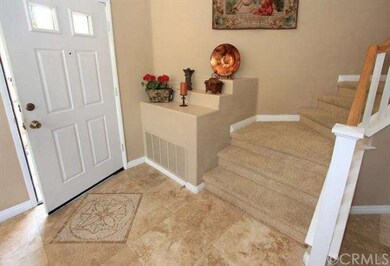 Inlaid travertine entrance
