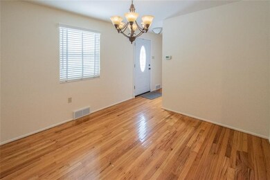 The Dining Room is to the Left of the Front Door /