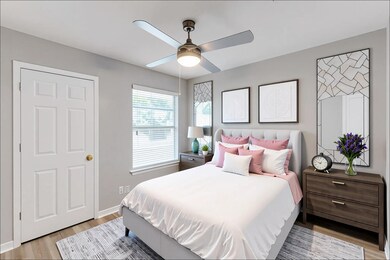 Bedroom featuring light wood finished floors and 