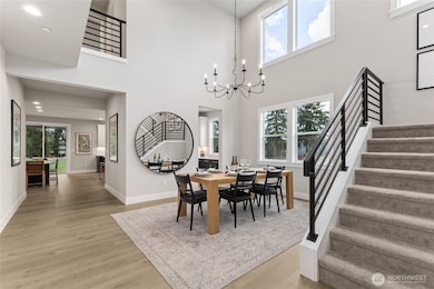 Enter into a 2-Story Dining with a wall of windows. Photos are for representational purposes only.  Colors and options may vary.