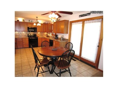 Dining Area Between the Kitchen and Family Room. F