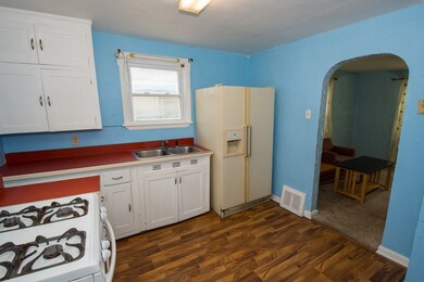 Easy clean up with laminate floors and counter top