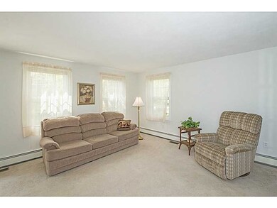 Living Room. Front corner of the home, to the left