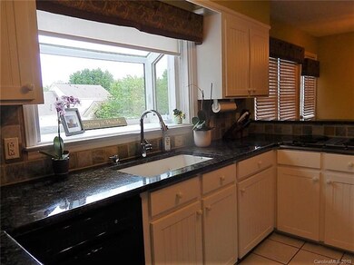 Don't you love the greenhouse window over the sink?