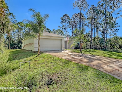 875 Natroma Ave SW, Palm Bay, FL 32908 - photo 2