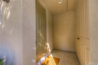 Front door to the left