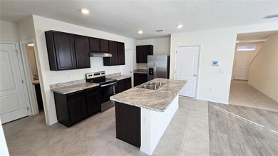 1671 Rosy Dale Cir, Davenport, FL 33837 - photo 6