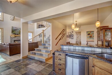 Kitchen Opens to Living Room and Dining Room