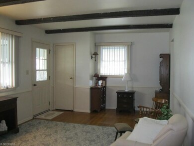 View of the Living room, freshly painted, nail hol