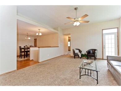 Open floor plan, spacious great room with art shel