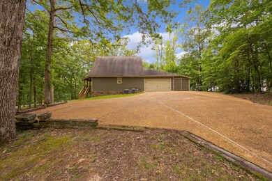 View of yard with a garage