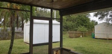 SCREENED PATIO W/ WOOD CEILING